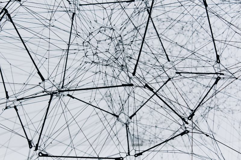 A visual of a network in black and white.